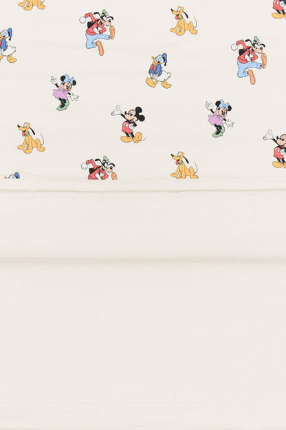 Back side fabric of Toddler Blanket in Mickey Mouse and Friends print on an oat background