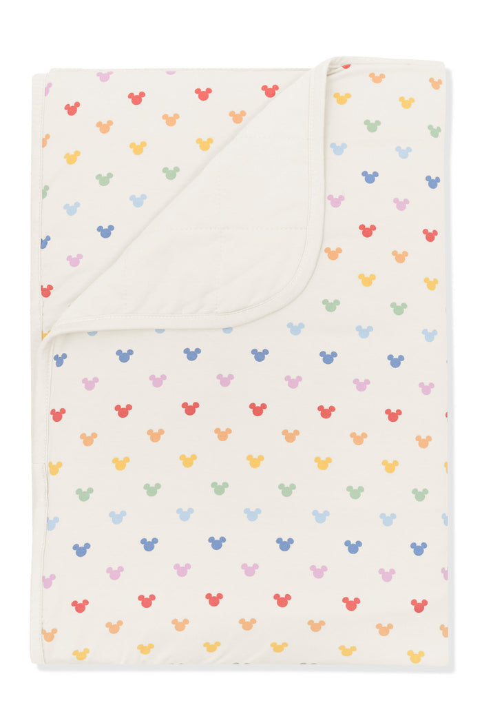 Toddler Blanket with Pastel Mickey Mouse pattern on an oat background