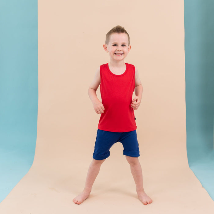 Boy wearing Kyte Baby Toddler Tank Top in Cardinal
