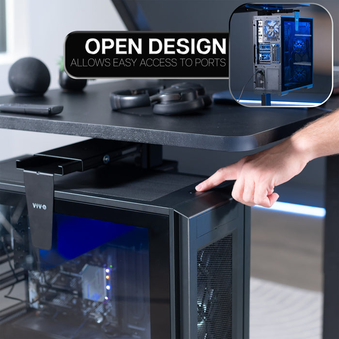 PC Mount with open design showing easy access to ports, featuring a hand reaching towards the desk.