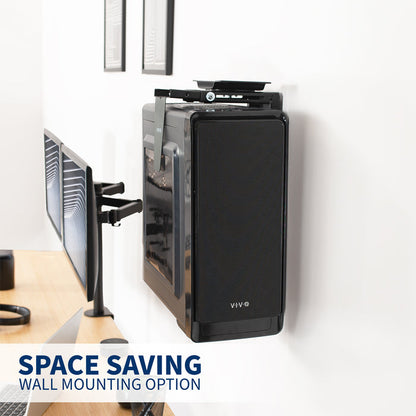 Black computer case mounted on a white wall with text 'Space Saving Wall Mounting Option'.