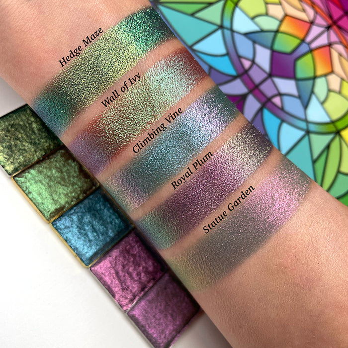 Top angled arm swatches on fair skin of Wall of Ivy Earth Vibrant Multichrome shifts compared to Hedge Maze, Climbing Vine, Royal Plum and Statue Garden