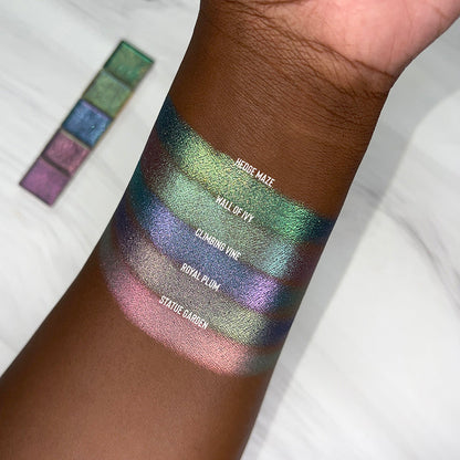 Top angled arm swatches on deep skin tone of Wall of Ivy Earth Vibrant Multichrome shifts compared to Hedge Maze, Climbing Vine, Royal Plum and Statue Garden