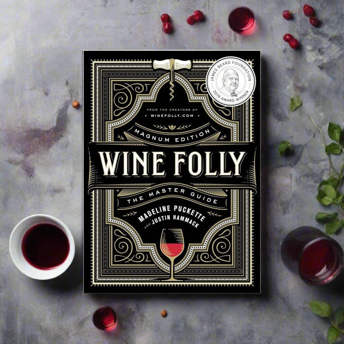 black cookbook with white fancy writing
