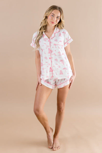 Female model posing wearing the Women's Short Sleeve Pajama Set in Toile Ballet